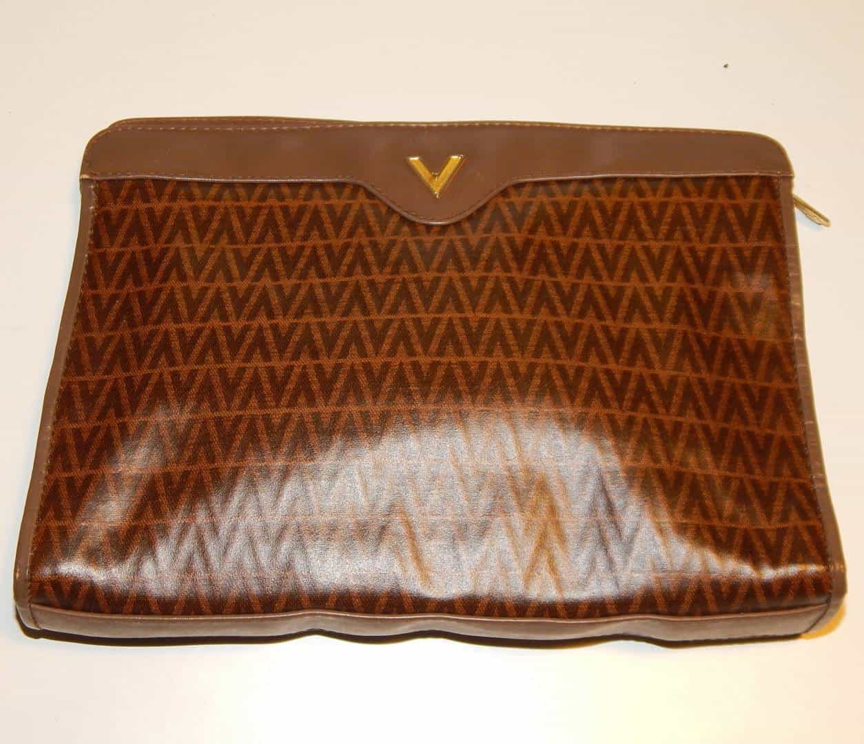 Mario Valentino Authenticated Leather Clutch Bag