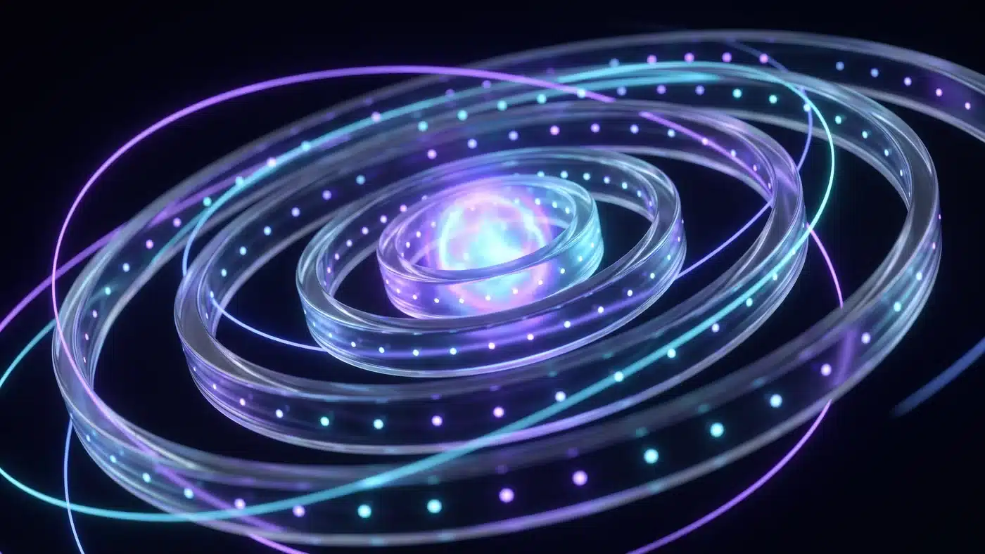 Four concentric glass rings turning at different speeds around a glowing core